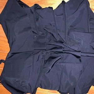 black ruffled one piece